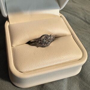 Sterling silver ring with white stones